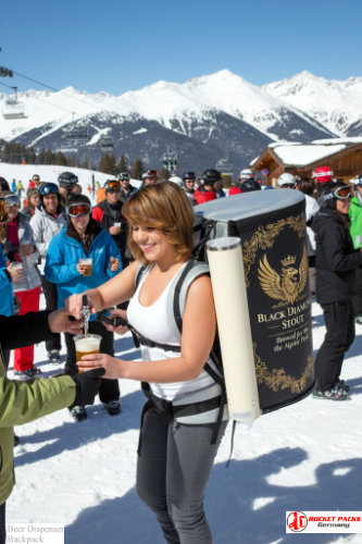 Beer backpack offering hot and cold drink service at Minneapolis winter festival.