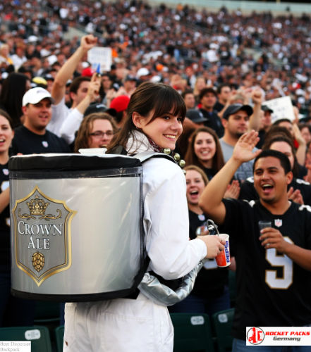 Beer hawker backpack supporting live audience service at Cardiff rugby stadium.